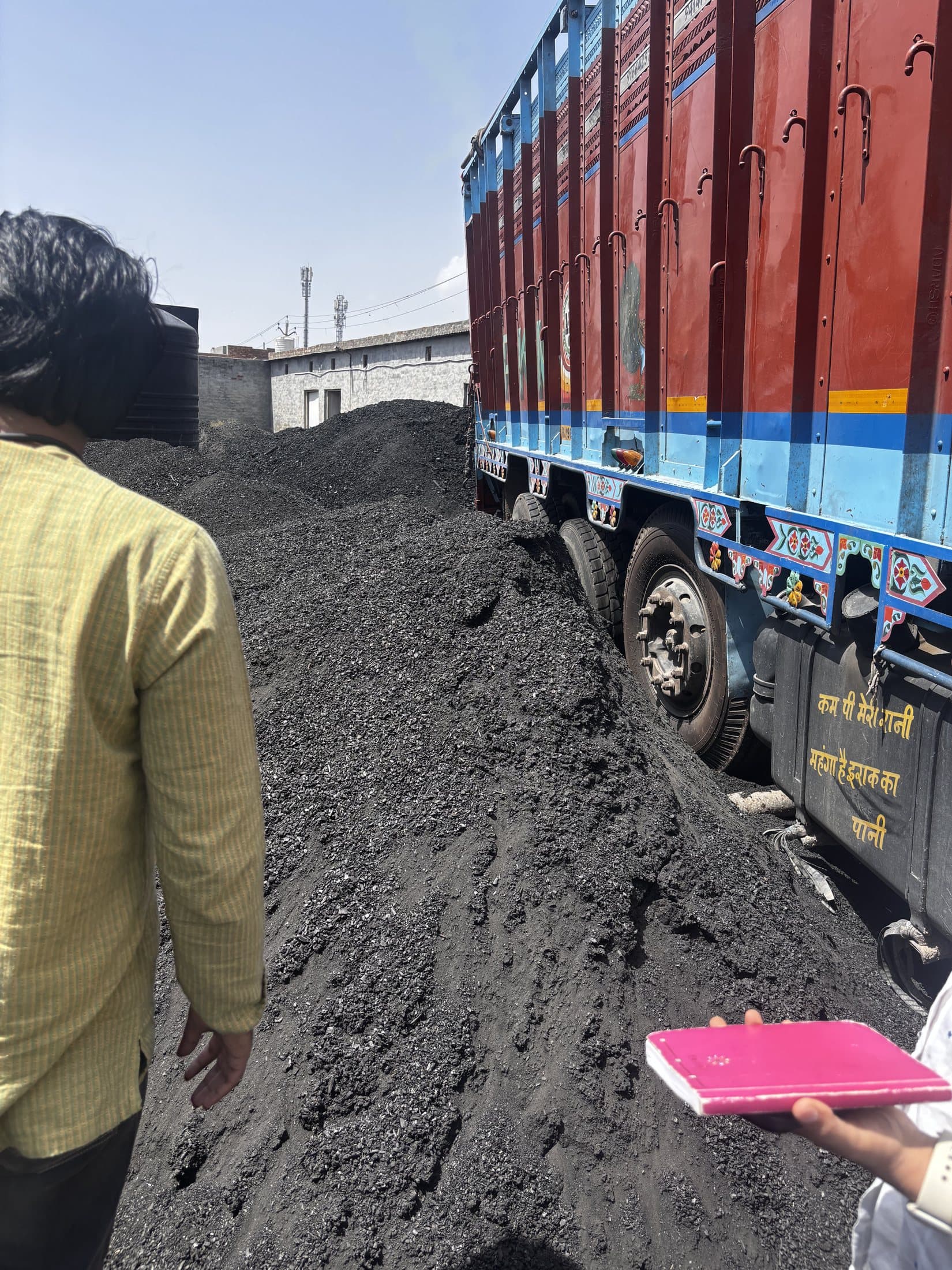 Biochar being received and measured at the study site